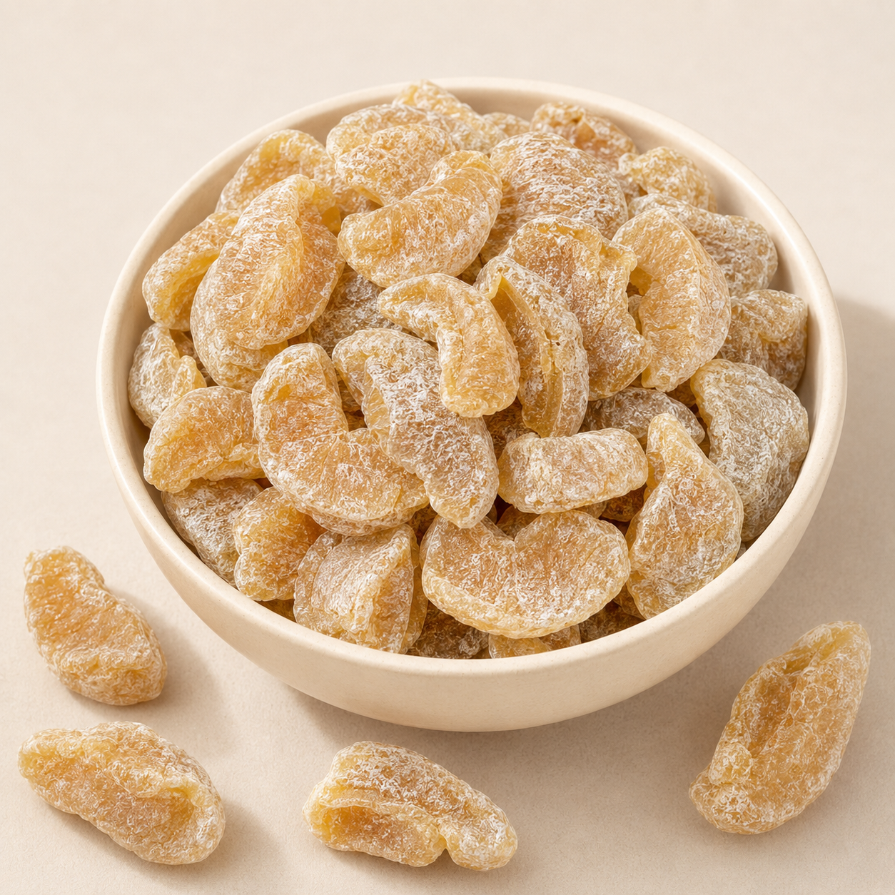 Sweet Meetha Amla Candy pieces with sugar coating in a ceramic bowl