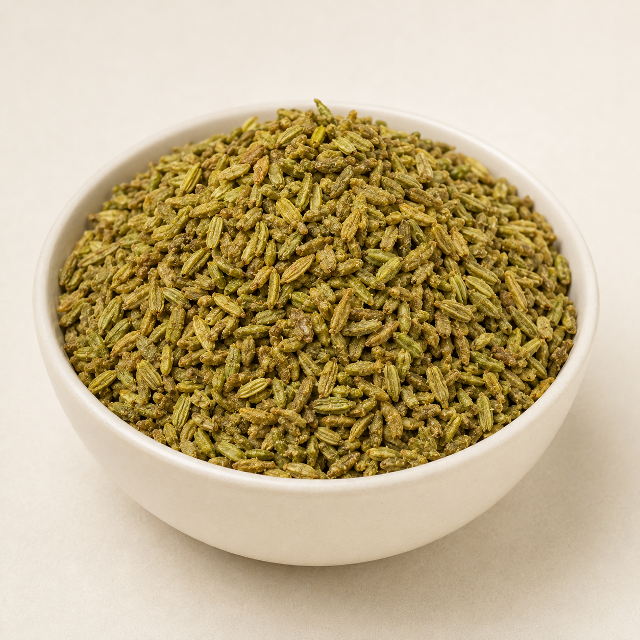 GovindJee Gur Saunf jaggery-coated fennel seeds in a ceramic bowl