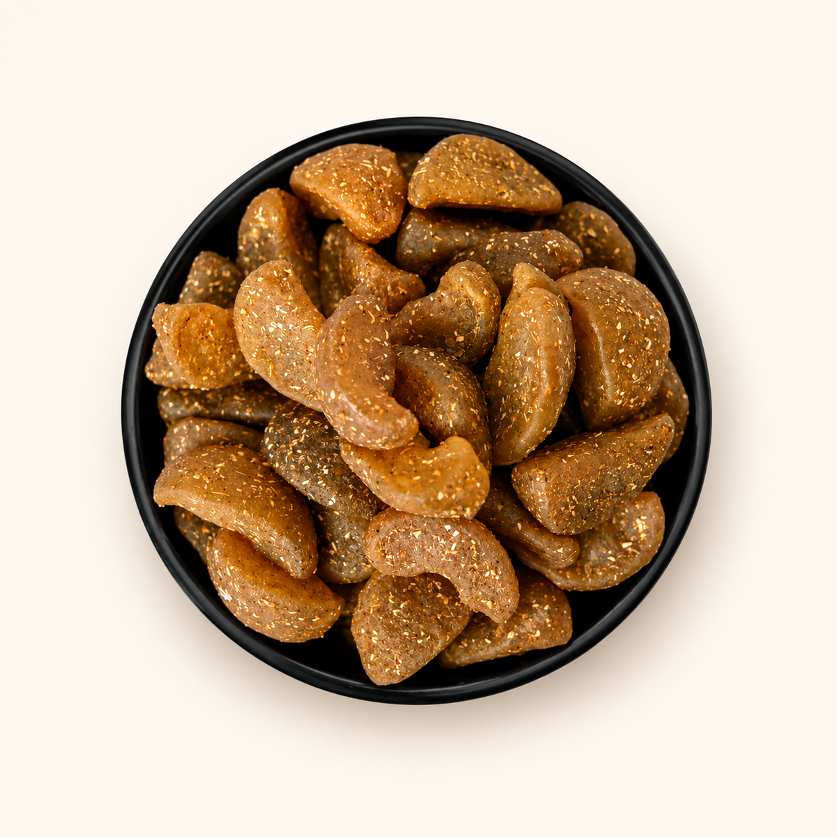 Amla Chatpata in a bowl on an off-white background