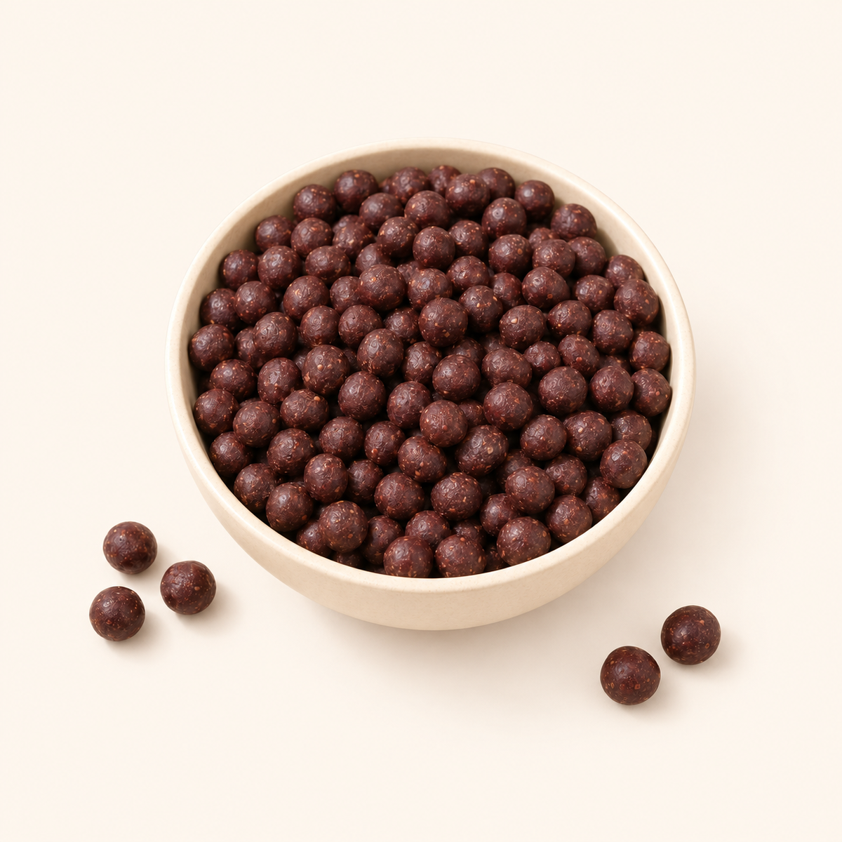 Beri Ka Ber Goli in a bowl on an off-white background