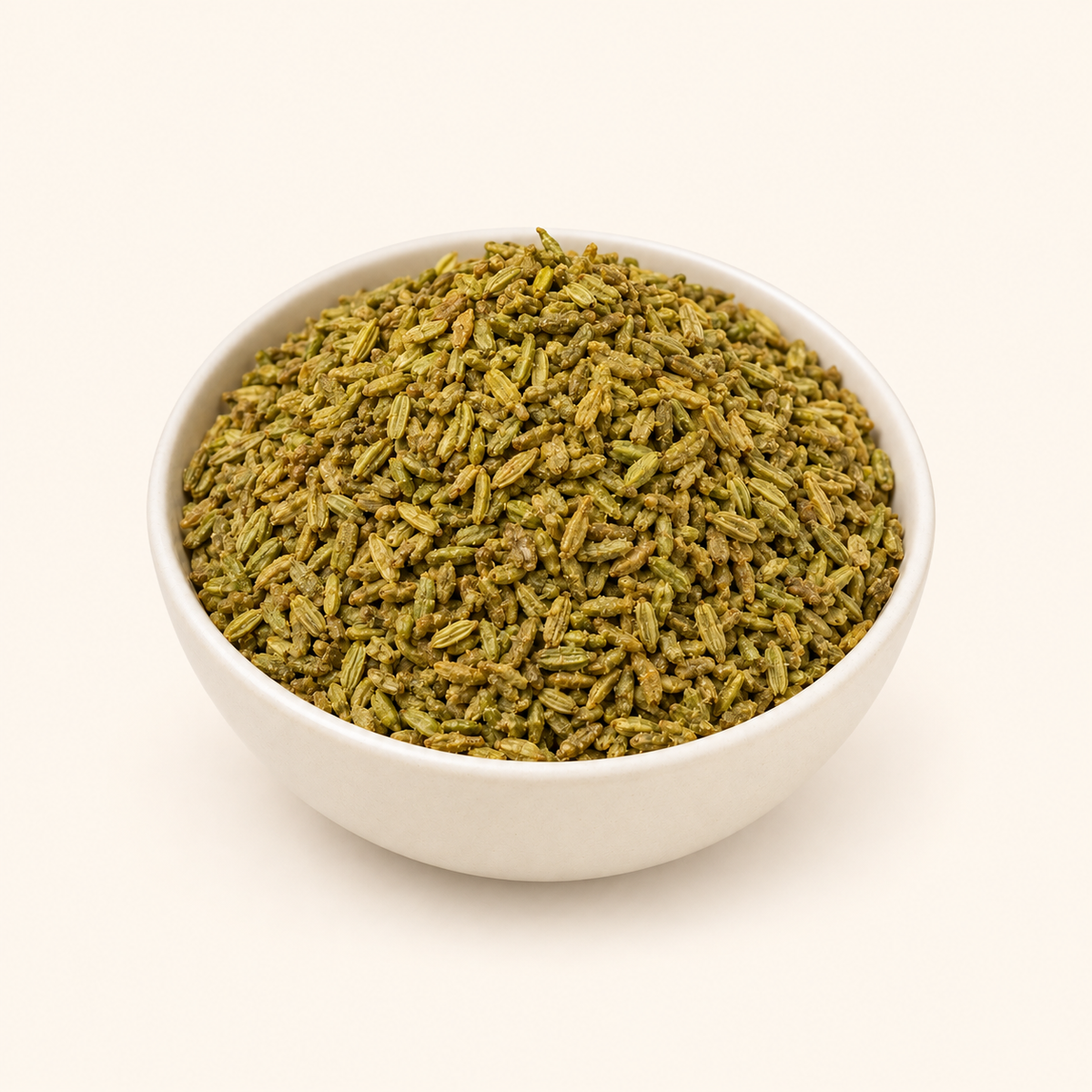 Gur Saunf in a bowl on an off-white background