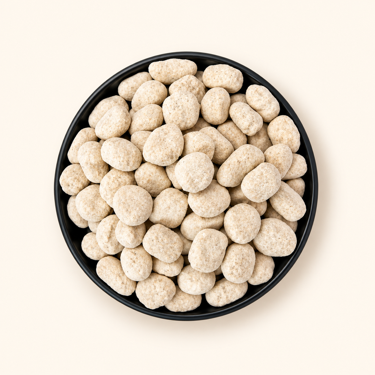 Hing Peda in a bowl on an off-white background