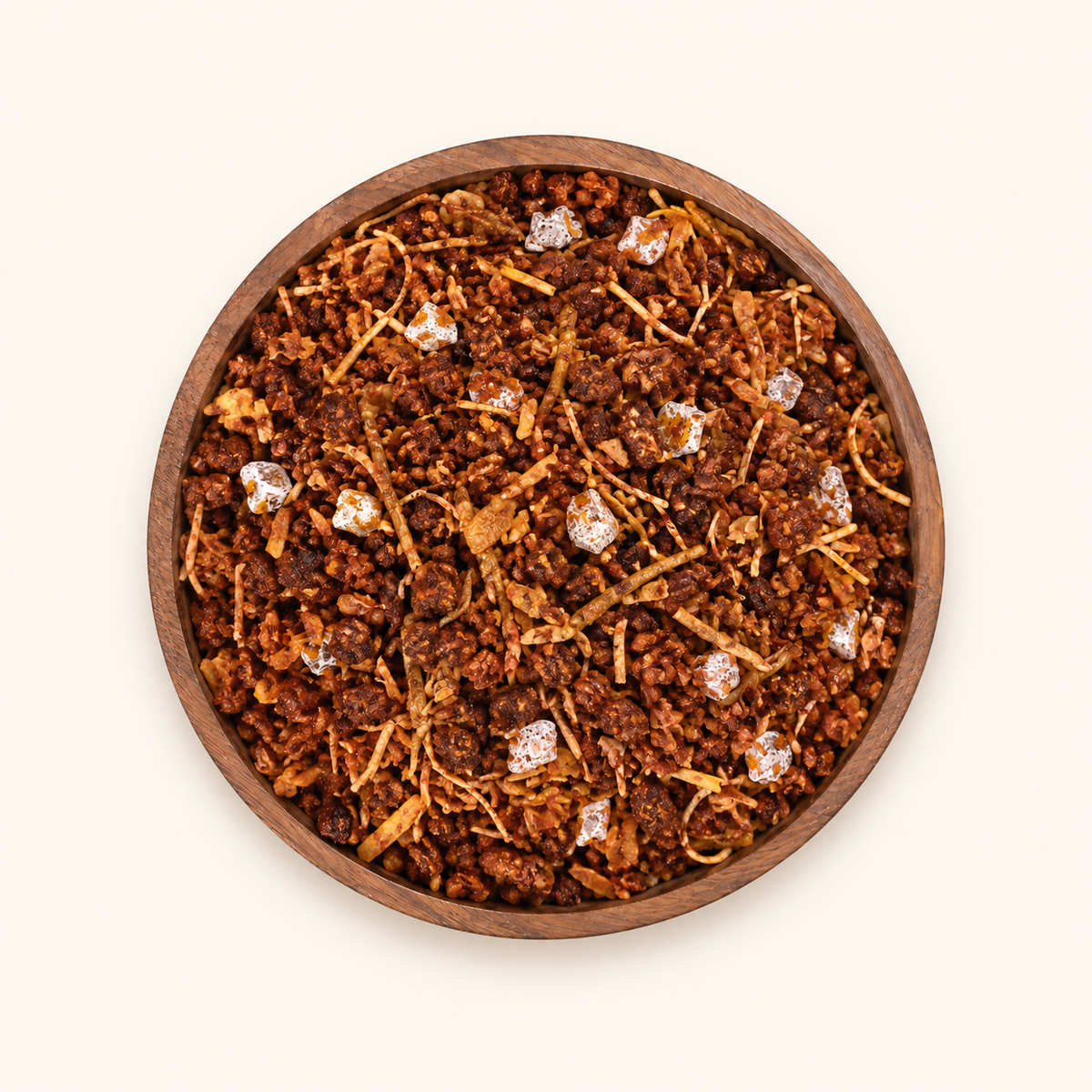 Jhilmil Supari in a bowl on an off-white background