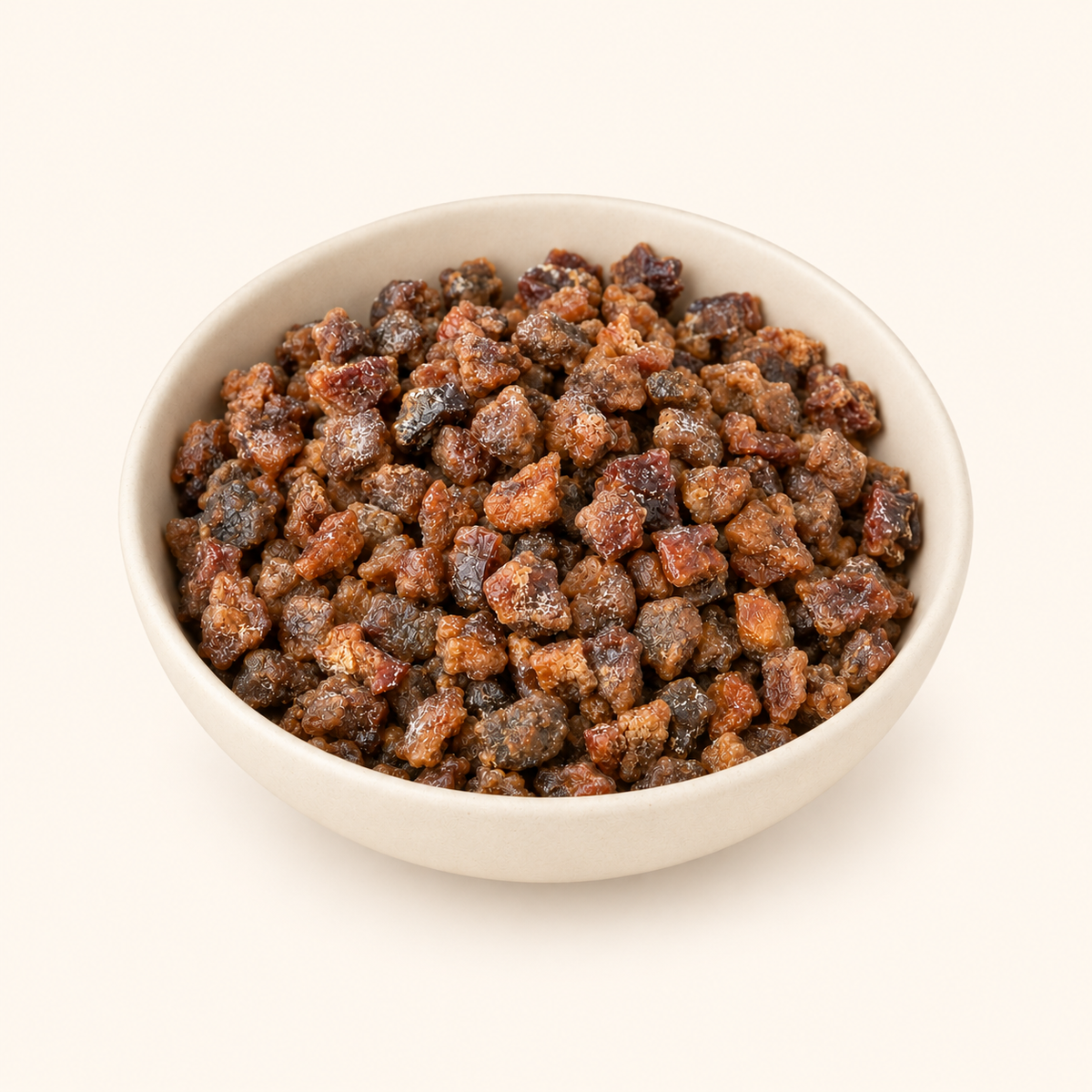 Madhur Chhuara in a bowl on an off-white background