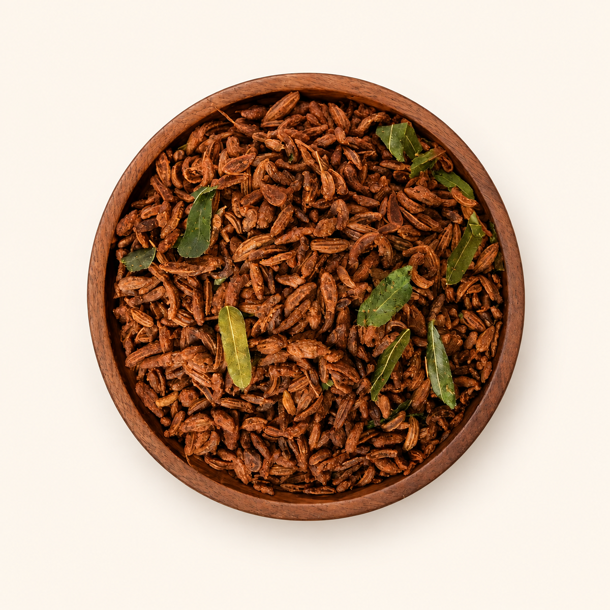 Marwadi Saunf in a bowl on an off-white background