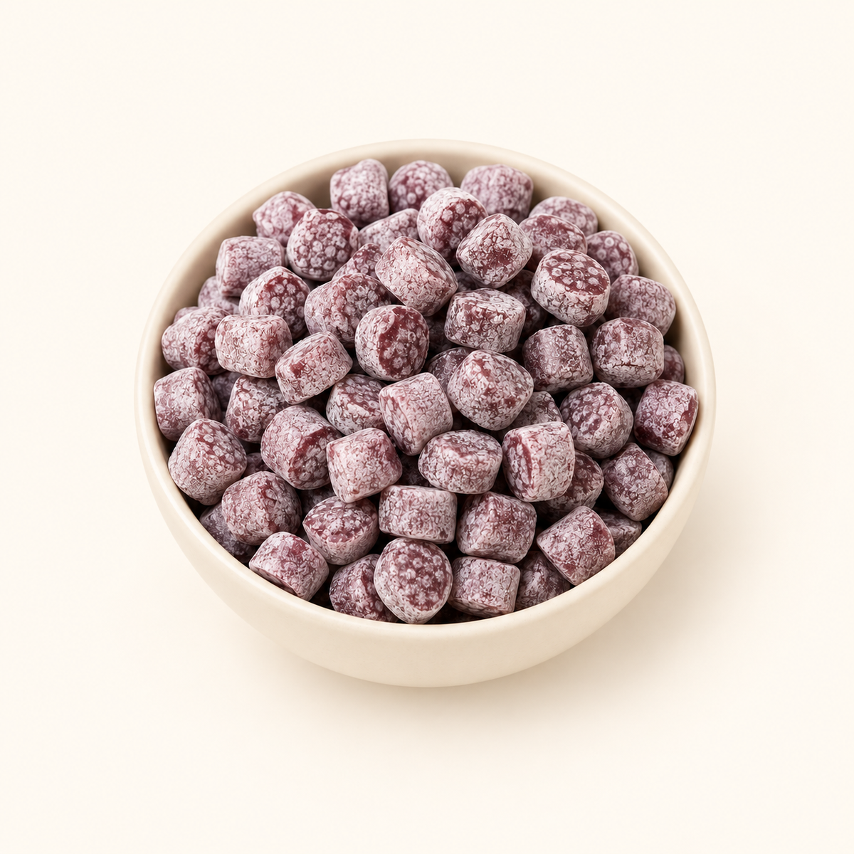 Masala Candy in a bowl on an off-white background