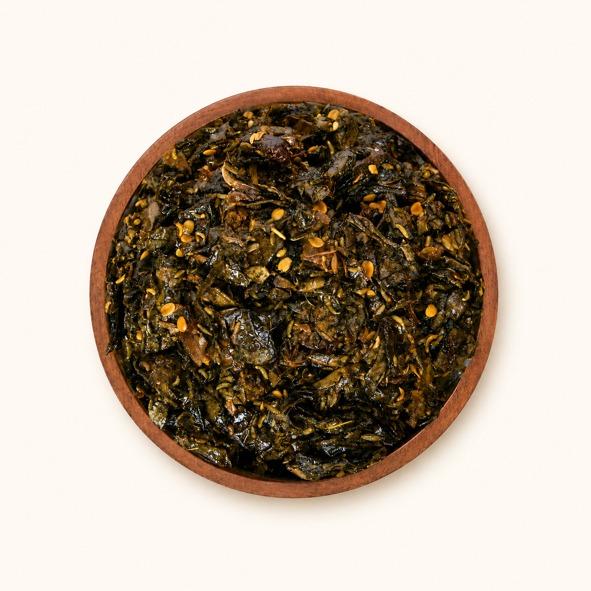 Navratan Pan in a bowl on an off-white background