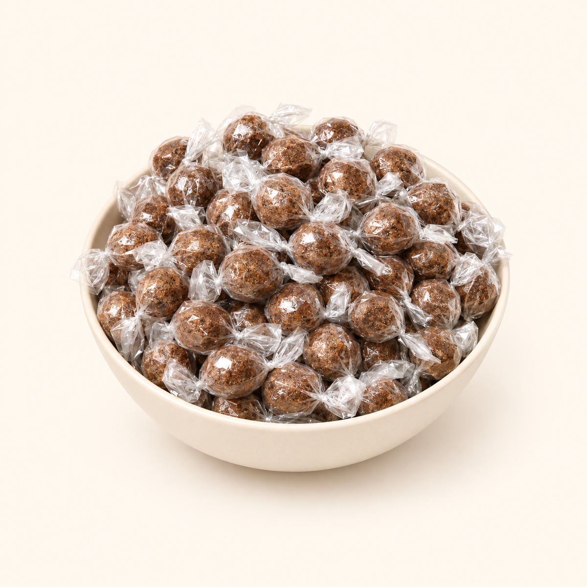 Tamarind Candy in a bowl on an off-white background